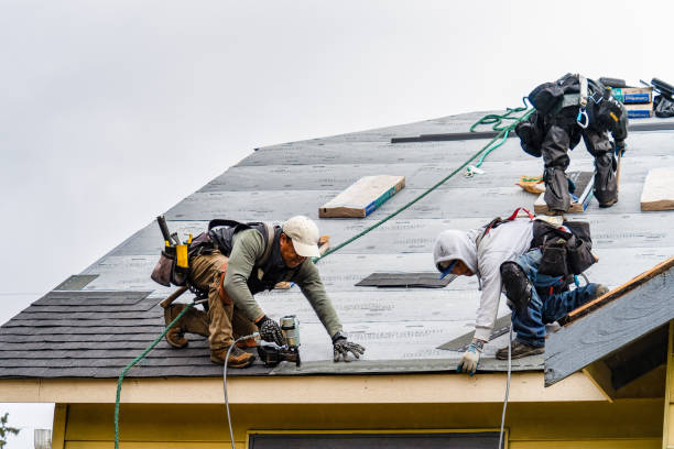 Professional Emergency Roof Repair technician working in Glen Oaks, NY